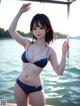 A woman in a bikini standing on a dock by the water.